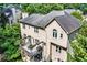 Charming home with a spacious deck for outdoor entertaining and enjoyment among the surrounding trees at 2138 Jockey Hollow Nw Dr, Kennesaw, GA 30152