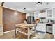 Modern kitchen featuring stainless steel appliances, an island with seating, and ample cabinet space at 2138 Jockey Hollow Nw Dr, Kennesaw, GA 30152