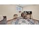 Cozy office space with modern desk and a comfortable seating area and decorative rug at 2138 Jockey Hollow Nw Dr, Kennesaw, GA 30152
