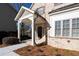 Inviting front porch with brick facade and craftsman-style details at 1300 Winfair Ne Ln, Brookhaven, GA 30329
