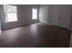 Spacious bedroom features modern floors, dual closets, and plenty of natural light at 315 Dressage Ct, Riverdale, GA 30296