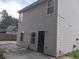 Siding view of home's exterior showing the walkout basement area at 315 Dressage Ct, Riverdale, GA 30296