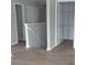Hallway with staircase and doors leading to other rooms on the second floor at 315 Dressage Ct, Riverdale, GA 30296