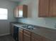 Functional kitchen with stainless steel sink, spacious countertops, and ample cabinet space at 315 Dressage Ct, Riverdale, GA 30296