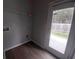 Practical laundry room with shelving, and convenient access to the outdoors at 315 Dressage Ct, Riverdale, GA 30296