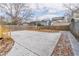 Backyard concrete patio with wooden deck and a backyard ready for outdoor activities and gatherings at 263 Ohm Ave, Avondale Estates, GA 30002