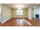 Bright dining room featuring hardwood floors, a chandelier, and classic trim at 263 Ohm Ave, Avondale Estates, GA 30002