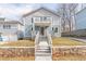 A charming two-story home with a small second-story balcony and inviting front entrance at 263 Ohm Ave, Avondale Estates, GA 30002