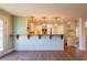 Kitchen bar with pendant lights and seating area at 263 Ohm Ave, Avondale Estates, GA 30002