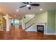 Spacious living room with hardwood floors and a staircase at 263 Ohm Ave, Avondale Estates, GA 30002