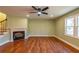 Cozy living room with a fireplace and large windows for natural light at 263 Ohm Ave, Avondale Estates, GA 30002