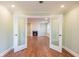 Living room showcasing fireplace viewed through glass french doors at 263 Ohm Ave, Avondale Estates, GA 30002
