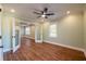 Light-filled living room with hardwood floors, and glass paneled French doors at 263 Ohm Ave, Avondale Estates, GA 30002