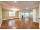 Spacious living room featuring hardwood floors, a fireplace, and an open layout at 263 Ohm Ave, Avondale Estates, GA 30002