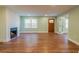 Inviting living room featuring hardwood floors, a fireplace, and lots of natural light at 263 Ohm Ave, Avondale Estates, GA 30002