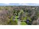 Aerial view of neighborhood homes lined along a street, surrounded by trees at 282 Oak Se Dr, Atlanta, GA 30354