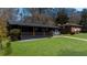 Charming ranch-style home with a welcoming front porch and a lush green lawn at 282 Oak Se Dr, Atlanta, GA 30354