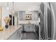Well-equipped kitchen with stainless steel appliances, gray cabinets, and granite countertops at 282 Oak Se Dr, Atlanta, GA 30354