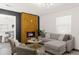 Cozy living room with modern fireplace, comfortable sectional sofa, and stylish decor at 282 Oak Se Dr, Atlanta, GA 30354
