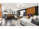 Open-concept living room with hardwood floors and stylish modern decor at 282 Oak Se Dr, Atlanta, GA 30354
