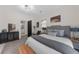 Beautiful main bedroom with gray accents and a decorative cabinet at 282 Oak Se Dr, Atlanta, GA 30354