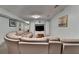 Spacious basement living area featuring a large sectional sofa and built-in entertainment center at 639 Oak Moss Dr, Lawrenceville, GA 30043