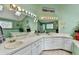 Bathroom with double sinks, large mirror, and stylish decor creating a spa-like atmosphere at 639 Oak Moss Dr, Lawrenceville, GA 30043