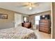 Bedroom featuring light-colored walls, wooden furniture, and white door at 639 Oak Moss Dr, Lawrenceville, GA 30043