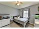 Relaxing bedroom with a soft bed, fish tanks, modern decor, and neutral tones at 639 Oak Moss Dr, Lawrenceville, GA 30043
