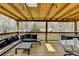 Inviting covered deck features string lights and comfortable outdoor seating at 639 Oak Moss Dr, Lawrenceville, GA 30043