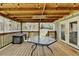 Cozy outdoor deck area complete with dining table at 639 Oak Moss Dr, Lawrenceville, GA 30043