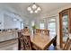 Bright dining room with view to living room and outdoor deck at 639 Oak Moss Dr, Lawrenceville, GA 30043