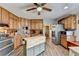Expansive kitchen featuring ample storage, stainless steel appliances, and a dining area nearby at 639 Oak Moss Dr, Lawrenceville, GA 30043