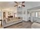 Cozy living room showcasing stylish decor and a modern ceiling fan at 639 Oak Moss Dr, Lawrenceville, GA 30043
