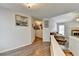 Open-concept living space with hardwood flooring, seamlessly connecting to other rooms in the home at 639 Oak Moss Dr, Lawrenceville, GA 30043