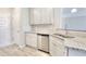 Well-appointed kitchen with stainless steel appliances, granite countertops, and ample cabinet space, perfect for culinary enthusiasts at 266 Eva Ne Way, Cartersville, GA 30121