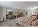 Large bedroom with large sitting area, bathroom and tv at 3452 Village Park Sw Ln, Atlanta, GA 30331