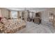 Spacious primary bedroom featuring sitting area and lots of natural light at 3452 Village Park Sw Ln, Atlanta, GA 30331