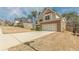 Well-maintained two-story home with an attached garage, perfect for suburban living at 3452 Village Park Sw Ln, Atlanta, GA 30331