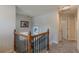 Upstairs hallway with carpet flooring and natural light at 3452 Village Park Sw Ln, Atlanta, GA 30331