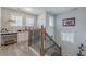 Carpeted upper level landing with a built-in desk and lots of natural light at 3452 Village Park Sw Ln, Atlanta, GA 30331