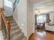 Staircase with wood railing near the living room at 3452 Village Park Sw Ln, Atlanta, GA 30331