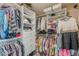 Closet featuring custom shelves and cabinets with plentiful space for storage and organization at 3452 Village Park Sw Ln, Atlanta, GA 30331