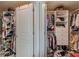 Walk-in closet with custom shelving and organization system for ample storage space at 3452 Village Park Sw Ln, Atlanta, GA 30331