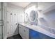 Bathroom featuring double sinks, marble countertops, and modern lighting at 1346 Stillwood Chase Ne, Atlanta, GA 30306