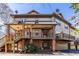 Exterior view of building with garage, porch, and second story balcony at 1346 Stillwood Chase Ne, Atlanta, GA 30306