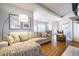 Bright and open living room with hardwood floors, a comfortable couch, and elegant decor at 1346 Stillwood Chase Ne, Atlanta, GA 30306