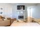 A modern living room design, with a marble fireplace and hardwood floors at 1346 Stillwood Chase Ne, Atlanta, GA 30306