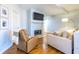 Bright living room with a marble fireplace and hardwood floors, perfect for relaxation at 1346 Stillwood Chase Ne, Atlanta, GA 30306