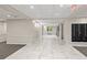 Bright lobby space features tile flooring, recessed lighting, and modern architectural design at 3655 Habersham Ne Rd # 215, Atlanta, GA 30305